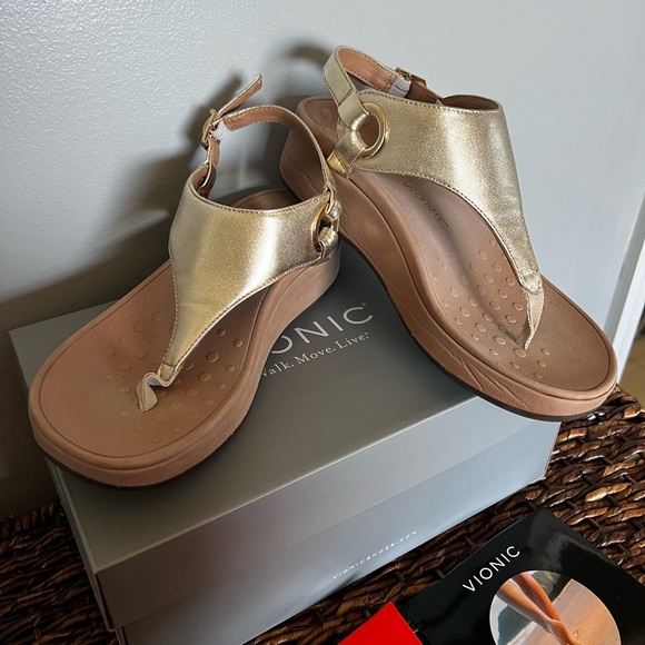 Size 7 (wide) Vionic Gold sandals. - Picture 1 of 11